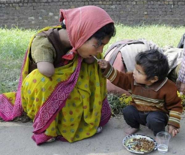 2 year old helping handicapped Mom